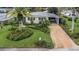 Aerial view of charming ranch home with lush landscaping at 270 Independence Ave # 10, Palm Harbor, FL 34684