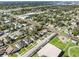 Aerial view of a house nestled in a residential neighborhood near a park at 2714 W Walnut St, Tampa, FL 33607