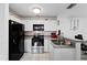 Kitchen boasts modern appliances and ample cabinet space at 3332 W Heiter St, Tampa, FL 33607