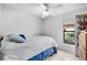 Small bedroom with full-size bed and window at 3332 W Heiter St, Tampa, FL 33607