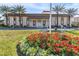 Attractive clubhouse with landscaping and palm trees at 4900 Brittany S Dr # 314, St Petersburg, FL 33715
