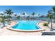Inviting community pool with lounge chairs, offering waterfront views at 4900 Brittany S Dr # 314, St Petersburg, FL 33715
