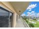 Spacious balcony with a white railing offering pleasant views of the surrounding landscape at 4900 Brittany S Dr # 314, St Petersburg, FL 33715
