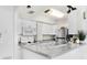 Modern kitchen featuring stainless steel appliances and granite countertops at 4900 Brittany S Dr # 314, St Petersburg, FL 33715