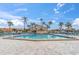 Relaxing community pool area with plenty of lounge chairs at 4900 Brittany S Dr # 314, St Petersburg, FL 33715
