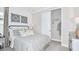 Charming bedroom with a comfortable bed and built-in closet at 759 Steel Dr, Apollo Beach, FL 33572
