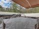 Hot tub with water features under covered patio at 8518 Tidal Breeze Dr, Riverview, FL 33569