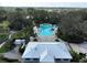 Community pool with surrounding landscaping at 8519 Sunshower Pl, Parrish, FL 34219