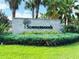 Summerwoods community entrance sign with stonework and landscaping at 8519 Sunshower Pl, Parrish, FL 34219