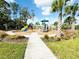 Playground with play structures and shaded area at 8519 Sunshower Pl, Parrish, FL 34219