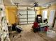 Spacious garage with a white door and ample storage space at 15918 Redington Dr, Redington Beach, FL 33708