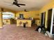Covered outdoor bar features bar seating and brick flooring, perfect for entertaining guests at 15918 Redington Dr, Redington Beach, FL 33708