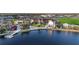 Beautiful aerial view of the Waterside community near a large lake with multiple buildings at 18096 Foxtail Loop, Venice, FL 34293
