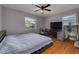 Main bedroom with king-size bed and hardwood floors at 1840 21St N Ave, St Petersburg, FL 33713