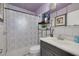 Clean bathroom with shower/tub combo and dark vanity at 1840 21St N Ave, St Petersburg, FL 33713