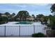 Community pool with surrounding fence at 29254 Bay Hollow Dr # 3262, Wesley Chapel, FL 33543