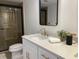 Modern bathroom with white vanity and gold fixtures at 29254 Bay Hollow Dr # 3262, Wesley Chapel, FL 33543