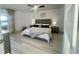 Bright bedroom with king bed and access to balcony at 29254 Bay Hollow Dr # 3262, Wesley Chapel, FL 33543