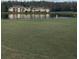 Condo building with water and golf course views at 29254 Bay Hollow Dr # 3262, Wesley Chapel, FL 33543