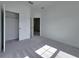 Well-lit bedroom with spacious closet and neutral carpeting at 3033 54Th N Ave, St Petersburg, FL 33714