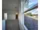 Upstairs bedroom with large window and view of neighborhood at 3033 54Th N Ave, St Petersburg, FL 33714