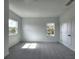 Spacious bedroom with neutral carpeting and ample light at 3033 54Th N Ave, St Petersburg, FL 33714