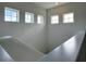 Bright landing with multiple windows overlooking neighborhood at 3033 54Th N Ave, St Petersburg, FL 33714