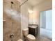 Bathroom with shower/tub combo, granite vanity, and tile flooring at 3033 54Th N Ave, St Petersburg, FL 33714