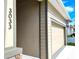 Beige two-car garage with gray trim at 3033 54Th N Ave, St Petersburg, FL 33714