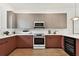 Modern kitchen with stainless steel appliances and wine cooler at 3035 1St S Ave, St Petersburg, FL 33712