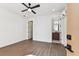 Simple bedroom with wood floors and access to bathroom at 3035 1St S Ave, St Petersburg, FL 33712