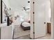 Bright bedroom with a comfortable bed, nightstands, and large window at 3035 1St S Ave, St Petersburg, FL 33712