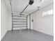 Spacious two car garage with sealed concrete floors and ample storage capacity at 3035 1St S Ave, St Petersburg, FL 33712