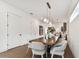 Bright dining room, featuring a large wooden table and comfortable seating for six at 3035 1St S Ave, St Petersburg, FL 33712
