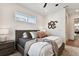 Bright bedroom with a comfortable bed and large window at 3035 1St S Ave, St Petersburg, FL 33712