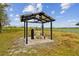 Well house with water pump and storage tank at 4401 Platt Rd, Plant City, FL 33565