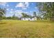 White house exterior with a large backyard at 4401 Platt Rd, Plant City, FL 33565