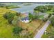 Aerial view of a house with a pool and a large yard at 4401 Platt Rd, Plant City, FL 33565