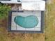 Kidney shaped pool with screened enclosure at 4401 Platt Rd, Plant City, FL 33565