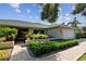 Beautiful home with well-maintained landscaping and walkway at 5104 W San Jose St, Tampa, FL 33629