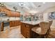Updated kitchen with a large island, custom cabinetry, and breakfast nook at 5479 Blue Heron Ln, Wesley Chapel, FL 33543