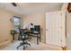 Home office with a desk, chair, and window at 5479 Blue Heron Ln, Wesley Chapel, FL 33543