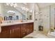 Bathroom boasts double vanity, large shower and soaking tub at 5479 Blue Heron Ln, Wesley Chapel, FL 33543