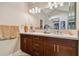 Double vanity bathroom with modern finishes and good lighting at 5479 Blue Heron Ln, Wesley Chapel, FL 33543