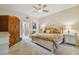 Large main bedroom with plush carpet and ample closet space at 5479 Blue Heron Ln, Wesley Chapel, FL 33543