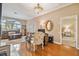 Home office with hardwood floors, and access to a bedroom at 5479 Blue Heron Ln, Wesley Chapel, FL 33543