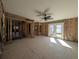 Interior of a room under construction with exposed framing at 615 78Th Ave, St Pete Beach, FL 33706