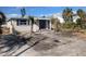 Single story home with a large yard and potential for landscaping at 615 78Th Ave, St Pete Beach, FL 33706