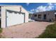 One car garage with attached patio and spacious backyard at 615 78Th Ave, St Pete Beach, FL 33706