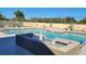 Community pool with fountain and plenty of deck space at 9100 Dr Martin Luther King Jr N St # 706, St Petersburg, FL 33702